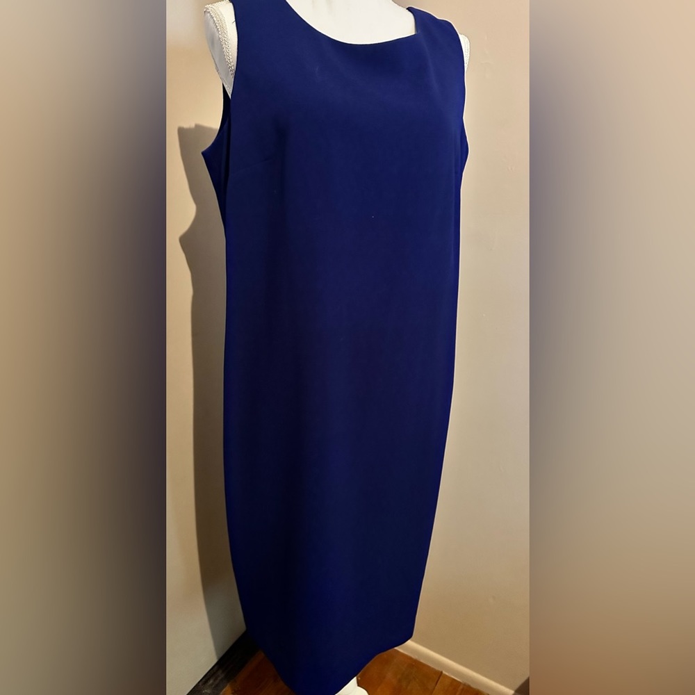 Sleeveless blue dress-zip up in the back. Lightweight,soft fabric- size 14